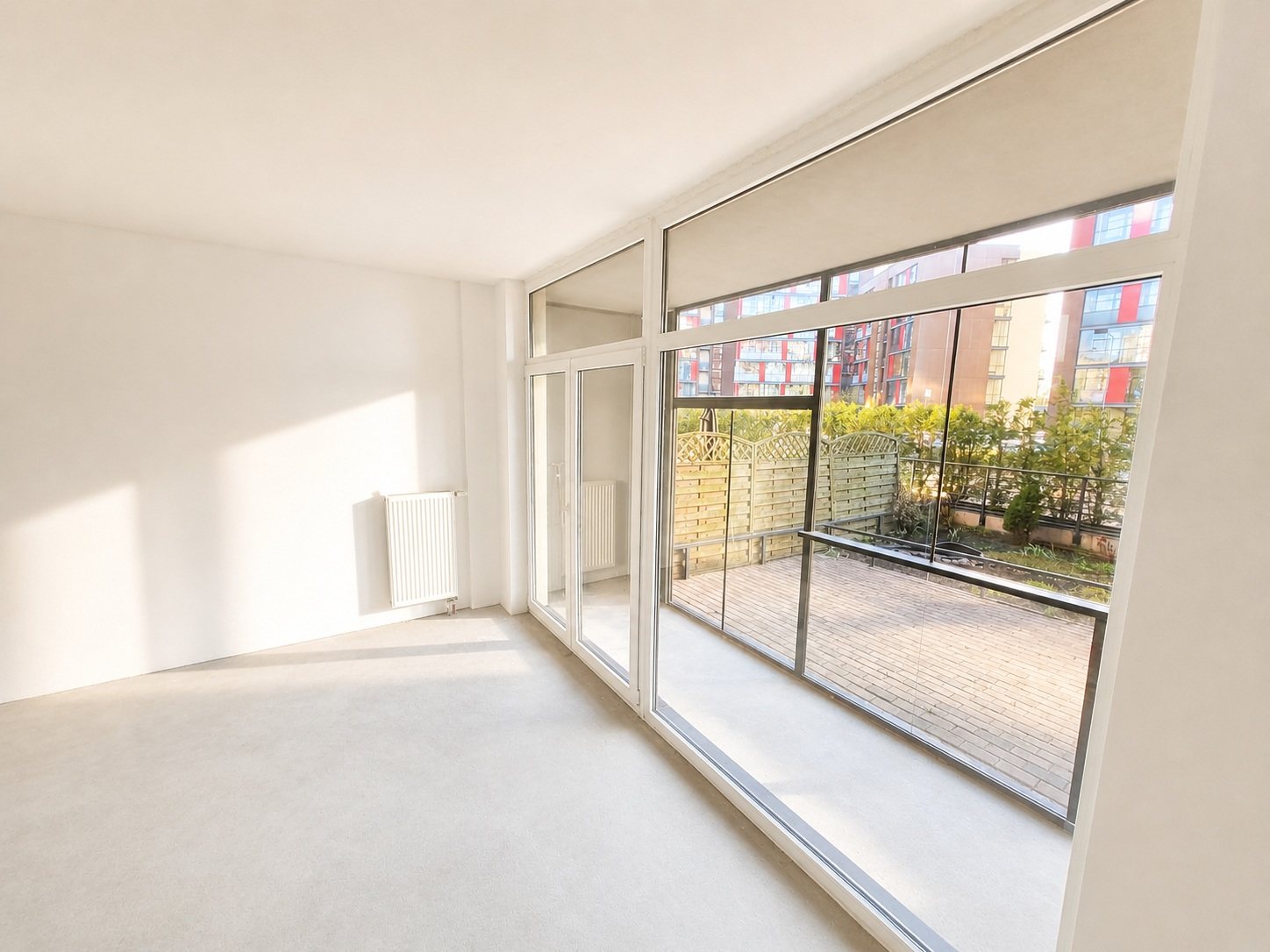 Panoramic windows in the living area — Pūces birzs apartment, Purvciems, Riga