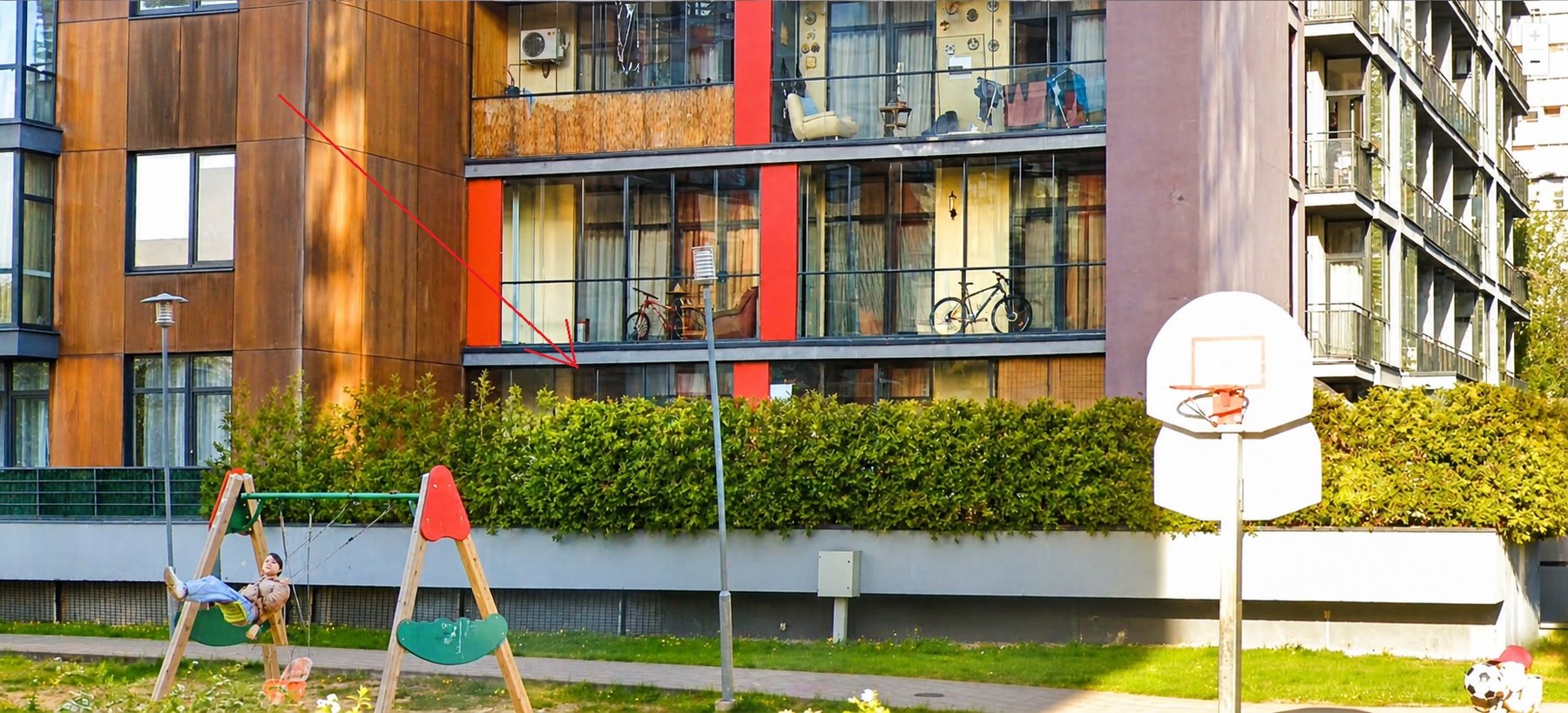 Children’s playground beside the building — Pūces birzs apartment, Purvciems, Riga
